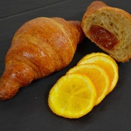 Wholemeal vegan brioches and orange